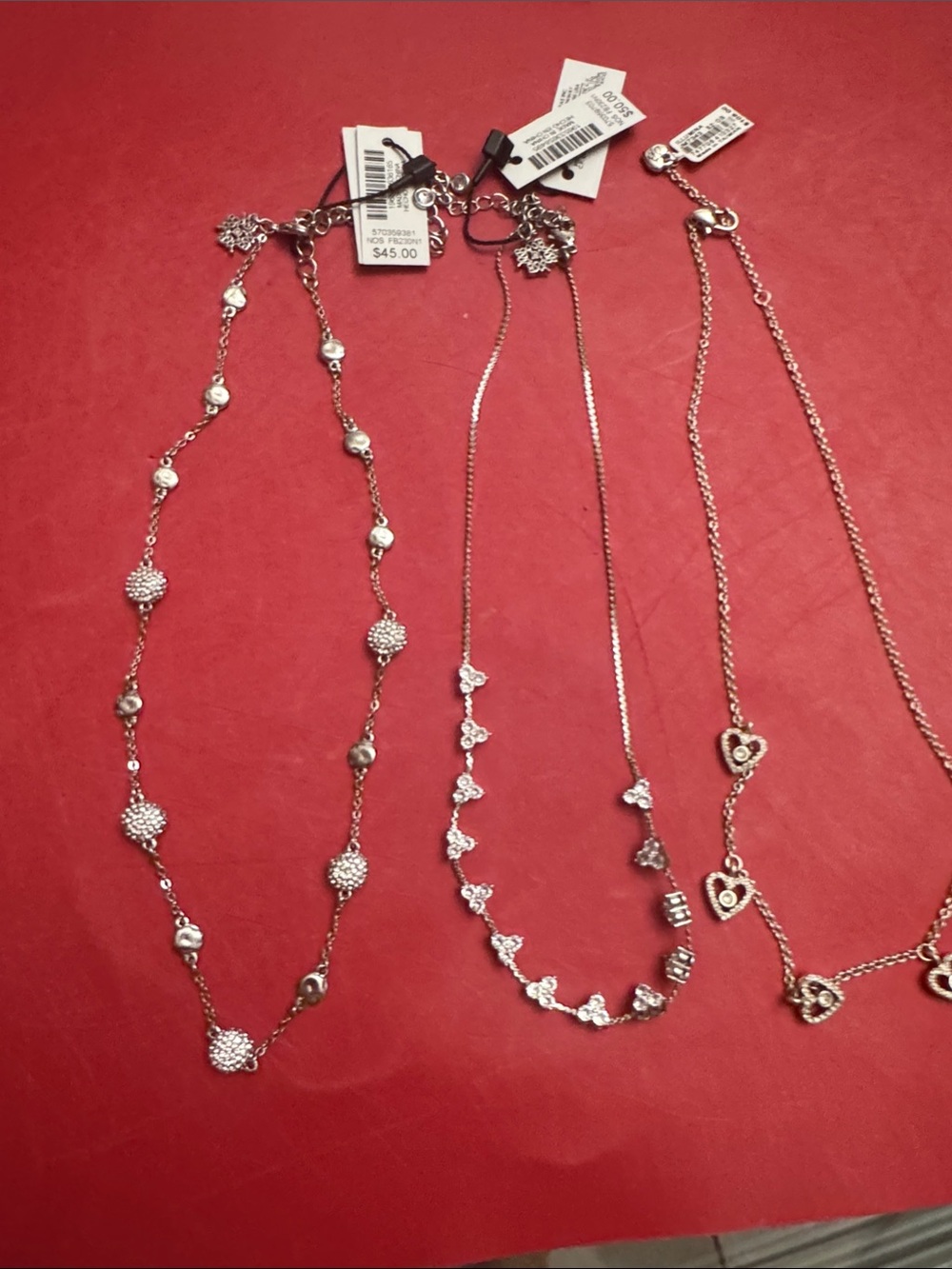 $5 gift(s) with Purchase  value  $210 Brighton, WHBM. Necklaces